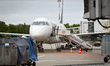 A LOT Polish Airlines Embraer 175 plane, registration SP-LID, stands on the apron at Warsa...