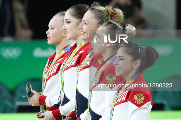 Athletes of Russia attend the awarding ceremony of women's team final of Artistic Gymnasitcs at the 2016 Rio Olympic Games in Rio de Janeiro...