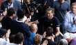 Alexander Zverev poses with his team after winning his final men's singles match against F...