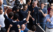 Alexander Zverev poses with his team after winning his final men's singles match against F...