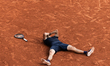 Alexander Zverev reacts after winning his final men's singles match against Flavio Cobolli...