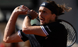 Alexander Zverev competes in his final men's singles match against Flavio Cobolli on day 1...