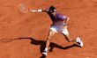 Flavio Cobolli competes in his final men's singles match against Alexander Zverev on day 1...
