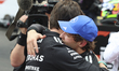Kimi Antonelli of Italy and the Mercedes-AMG Petronas F1 Team with Toto Wolff, team chief...