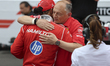 Fred Vasseur, team chief of Scuderia Ferrari, congratulates Lewis Hamilton of Great Britai...