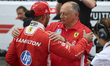 Fred Vasseur, team chief of Scuderia Ferrari, congratulates Lewis Hamilton of Great Britai...