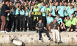 Kimi Antonelli of Italy and the Mercedes-AMG Petronas F1 Team celebrates with the team and...