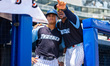 Josh Johnson, the Trenton Thunder hitting coach, talks to Joek Rivera of the Trenton Thund...