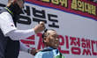 Members of the Federation of Korean Trade Unions' National Ready-Mixed Concrete Transport...