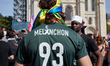 A supporter wearing a football T-shirt with ''Melenchon 93'' attends a rally to launch the...