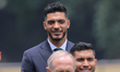 Raul Jimenez of the Mexican national soccer team participates in the flag-raising ceremony...