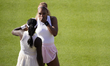 Serena Williams and Victoria Mboko compete during their round of 16 doubles match at The H...