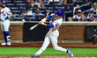 New York Mets player Carson Benge #3 doubles during the first inning of a baseball game ag...