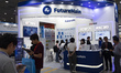 FutureMain demonstrates its technology at its exhibition booth during the 15th Smart Tech...