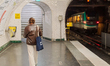 A woman exits the Paris Metro Gare de l'Est station in Paris, France, on June 4, 2026. Gar...