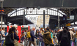 Passengers walk through the concourse of Gare de l'Est railway station in Paris, France, o...