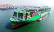 A cargo ship loaded with foreign trade containers enters Qingdao Port in Qingdao City, Sha...