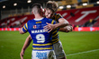Warrington Wolves players applaud the fans at full time during the Betfred Super League ro...