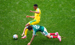 Thalente Mbatha of South Africa and Luis Chavez of Mexico compete for the ball during the...