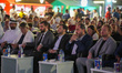 Football fans gather at the opening of the Damascus World Cup Festival, a public fan zone...