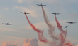 Members of the Indonesian Navy's Rajawali Laut Flight Team perform an aerobatic display du...