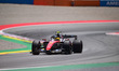Lewis Hamilton of Scuderia Ferrari drives in the paddock during qualifying for the Barcelo...
