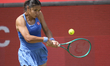 Emma Raducanu of Great Britain competes during her quarter-final match at The HSBC Champio...