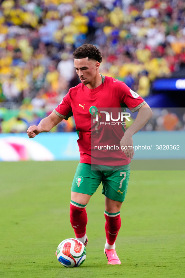 Chemsdine Talbi of Morocco runs with the ball during the FIFA World Cup 2026 Group C match between Brazil and Morocco at New York New Jersey... by Jose Breton/NurPhoto
