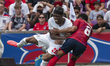 N. Madueke (#20) of England is fouled during the match between England and Costa Rica at I...