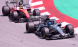 George Russelli of Mercedes-AMG PETRONAS Formula One Team and Lewis Hamilton of Scuderia F...