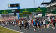 Fans gather on the track at the end of the race during the 24 Hours of Le Mans at the Circ...