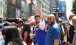 New York City Mayor Zohran Mamdani greets the crowds as he marches in the 69th Annual Puer...