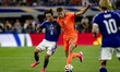 Takefusa Kubo of Japan and Mickey van de Ven of the Netherlands during the Netherlands vs....