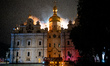A fire engine is outside the Dormition Cathedral at the Kyiv Pechersk Lavra, where the roo...
