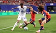 Laros Duarte of Cape Verde competes against Gavi and Marc Cucurella of Spain during the FI...