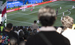 Iranian families watch a soccer match between Iran and New Zealand during their team's fir...