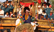 Nepali devotees pull the chariot of Lord Rato Macchindranath, known as Nepal's red god, to...
