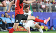 Ali Azayza #25 of Jordan controls the ball against Konrad Laimer #20 of Austria during the...
