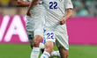 Abbosbek Fayzullaev #22 of Uzbekistan runs with the ball during the FIFA World Cup Group K...