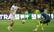 Azizbek Amonov #20 of Uzbekistan controls the ball during the FIFA World Cup Group K match...