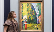 LONDON, UNITED KINGDOM - JUNE 18, 2026: A staff member poses with Wassily Kandinsky’s "Fra...