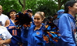 New York Knicks fans prepare for a celebration at the Knicks Championship Parade on Broadw...