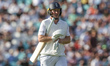 James New of England leaves the field after being dismissed during the 2nd Rothesay Test M...