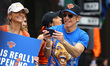 Actor and director Ben Stiller rides a float with New York Knicks players during a parade...