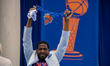 New York City Public Advocate Jumaane Williams holds up a chain during the New York Knicks...