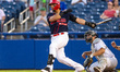 Abraham Favela of Team Mexico swings the bat during an MLB Draft League baseball game at T...