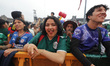 People attend the Mexico FIFA Fan Fest in the main square Zocalo to support the Mexico nat...