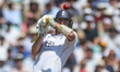 Matthew Fisher of England dodges a bouncer from Kyle Jamieson of New Zealand during the 2n...