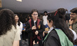 An Iranian woman dressed in a replica Hogwarts School of Witchcraft and Wizardry uniform f...