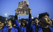 University students stage a protest against government policies, demanding lower fuel pric...